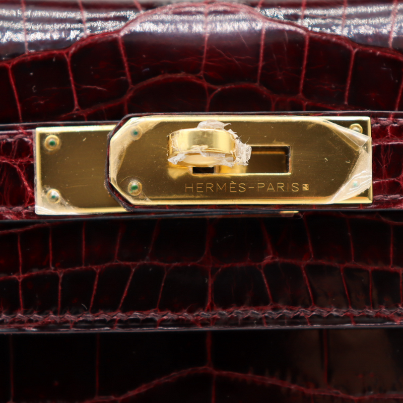 Hermès 28cm Kelly Sellier Bordeaux Shiny Niloticus Gold Hardware